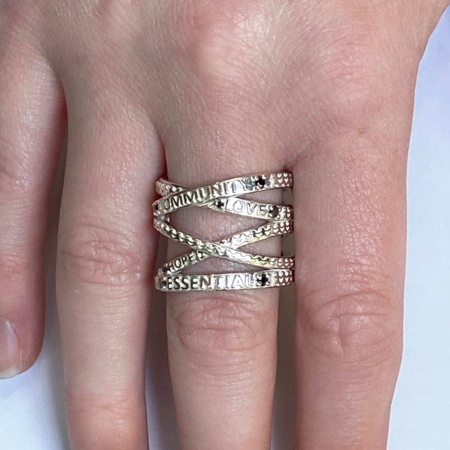 Custom jewelry, sterling silver gold "Not Nonessential" ring, llyn strong, greenville, South Carolina