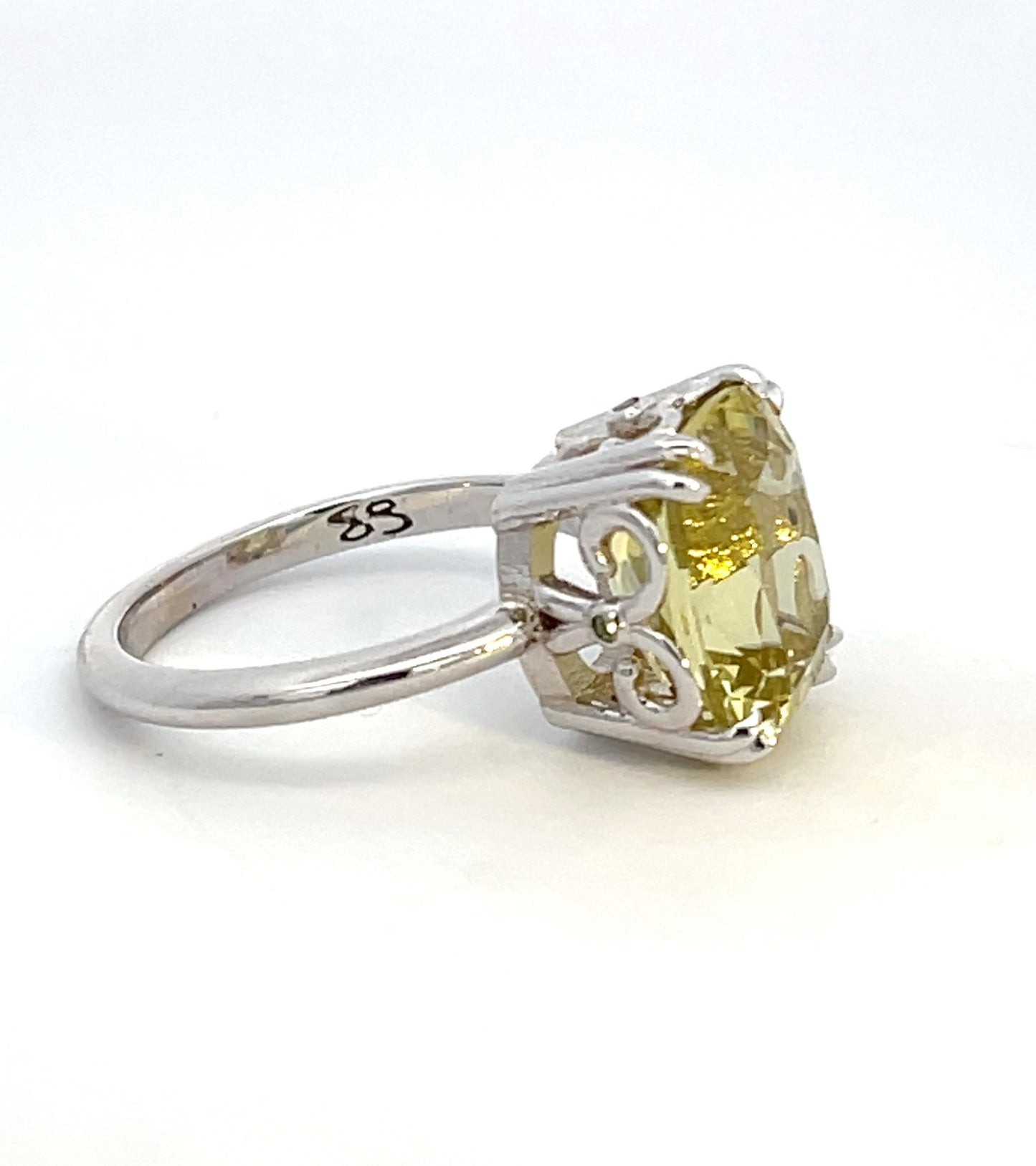 18k White Gold Ring with a Yellow Beryl and Tsavorite Garnets