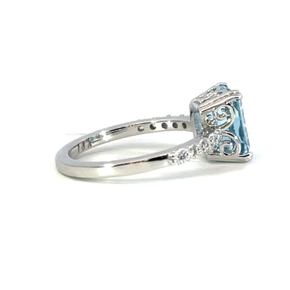 18k White Gold Scroll Ring with an Aquamarine and FS Diamonds