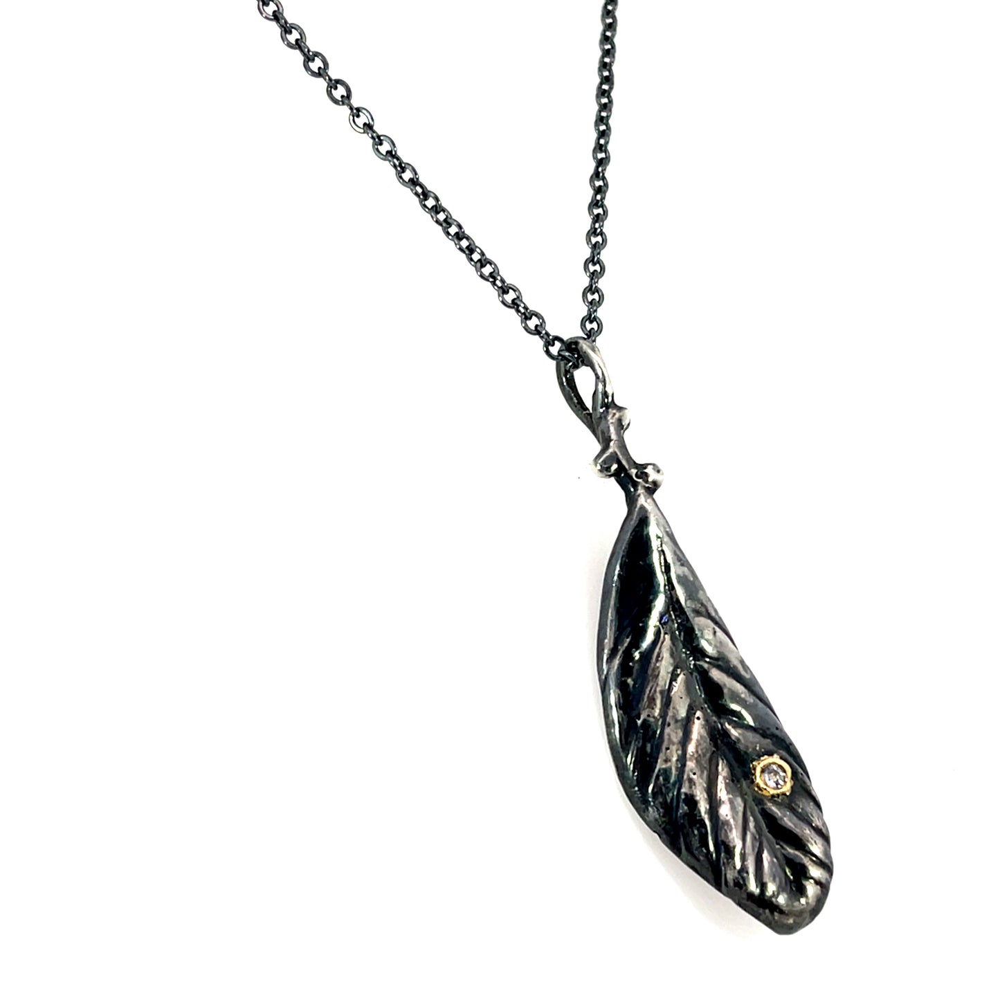 Oxidized Sterling Silver Leaf Pendant with a Tanzanite in 18k Yellow Gold