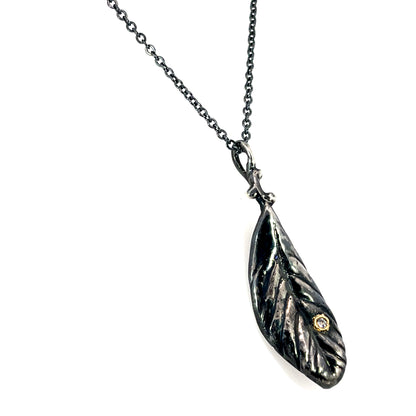 Oxidized Sterling Silver Leaf Pendant with a Tanzanite in 18k Yellow Gold