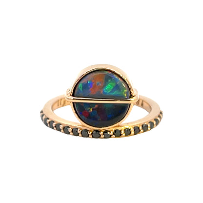 An 18K Rose Gold Offset Ring with a Australian Black Opal and Black diamonds.
