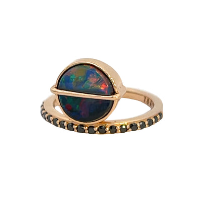 An 18K Rose Gold Offset Ring with a Australian Black Opal and Black diamonds.