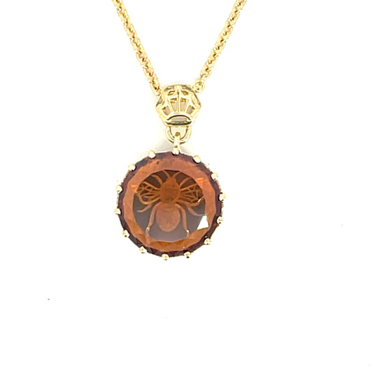18k Yellow Gold Pendant with a Hand Carved Lens Cut Garnet