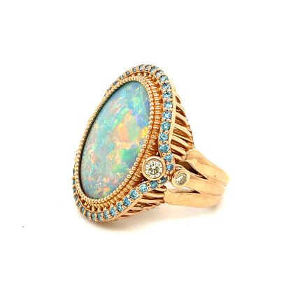An 18K Rose Gold Australian Opal Ring with Blue and Yellow Diamonds